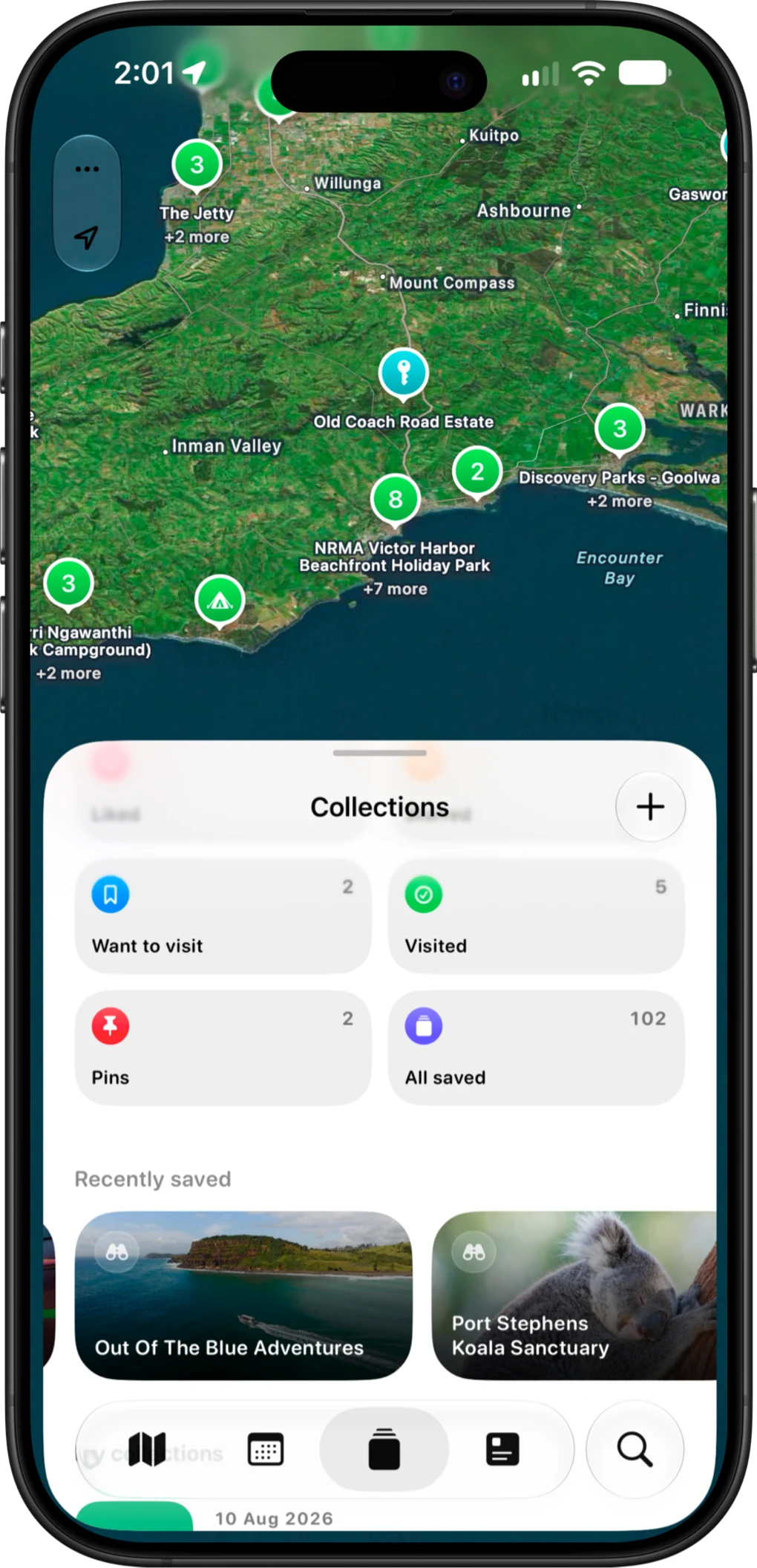 The AussieCamps collections screen with Want to visit, Visited, Pins and All saved lists over a satellite map